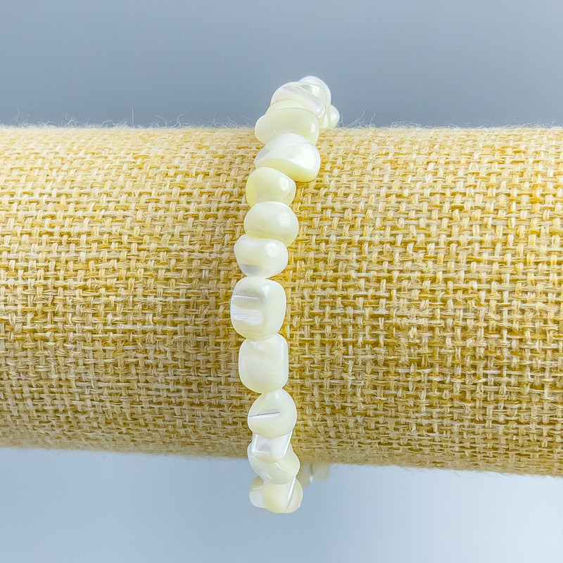 Bracelet White Mother-of-P pearl halved facets, diameter 8x6mm, length 18cm (stretch)