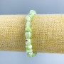 Bracelet Mother-of-P pearl light-green faceted beads, diameter 8×6mm ±, length 18cm (stretch)