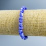 Bracelet with Purple Mother-of-P Pearl glassy faceted beads, diameter 8x6mm +-, length 18cm (stretch)