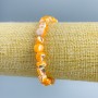 Bracelet Mother of Pearl light orange faceted beads, diameter 8x6mm+-, length 18cm (stretch)