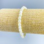 Bracelet Mother-of-P pearl barrel shape, diameter 6x6mm ±, length 18cm (stretch)