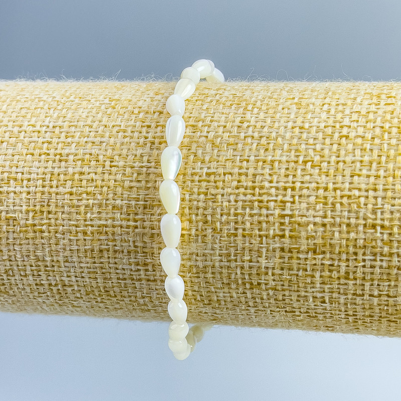 Bracelet with Mother-of-Pearl beads, 4x7 mm, stretch, length 18 cm