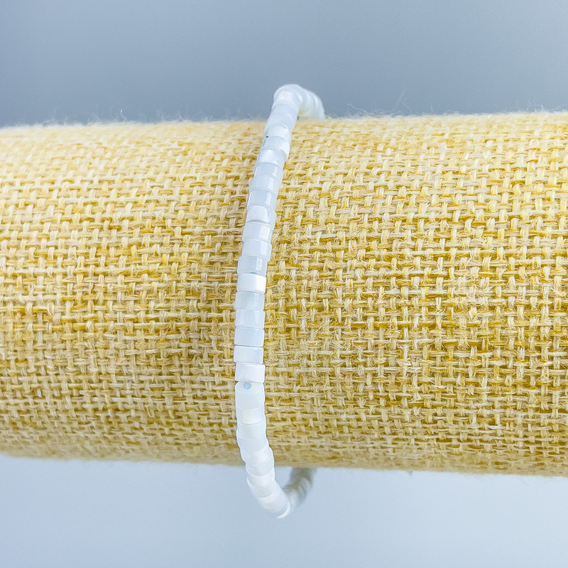 Bracelet with Tonal Pearl Light Blue, disc-shaped 4x2mm, stretch length 18cm