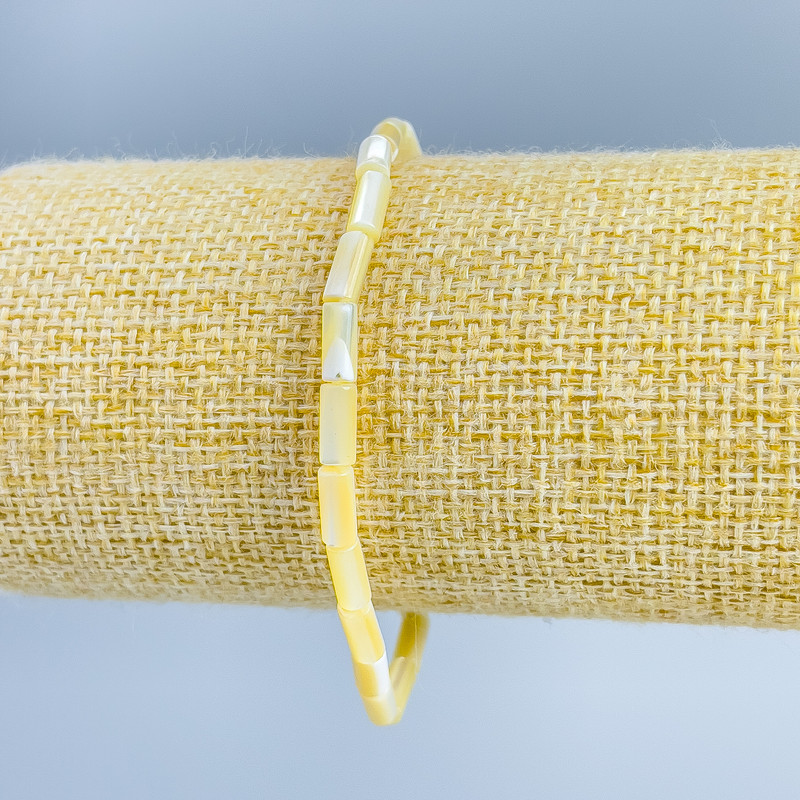 Bracelet with Turquoise-toned yellow mother-of-pearl, disc 4×2mm, length 18cm (stretch)