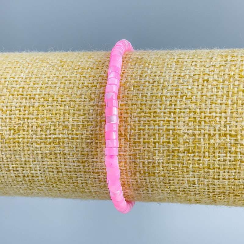Bracelet with Pink- toned Mother-of-Pearl, disc beads 4x2 mm, length 18 cm (stretch)