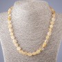 Necklace with natural rutilated quartz, gold hair-like inclusions, hammered coin beads, length 47 cm, bead diameter 5-10 mm