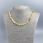 Citrine Beads with opaque faceted stones, 7x10 mm, length 50 cm