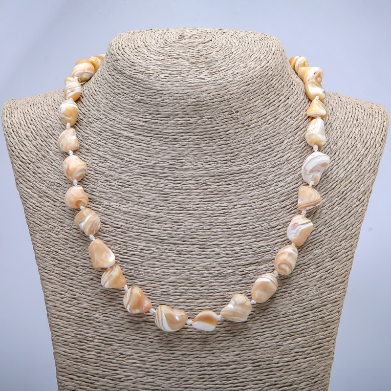 Necklace made of natural beige mother-of-pearl, grooved, diameter 19×12 mm ±, length 45 cm ±