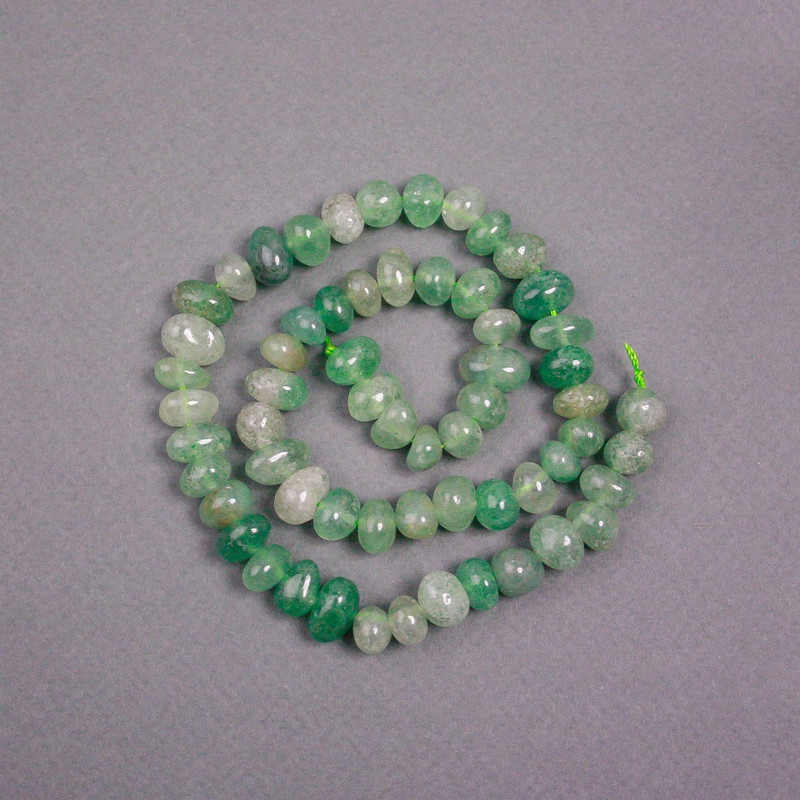 Beads on thread Natural Jade beads, faceted, 10×7 mm, length 39 cm