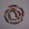 Petersite Beads on a Thread, Natural Stone Tumbled, 7×10 mm, ± length 38 cm