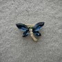 Brooch Butterfly with blue and white crystals on golden metal 20x28 mm+