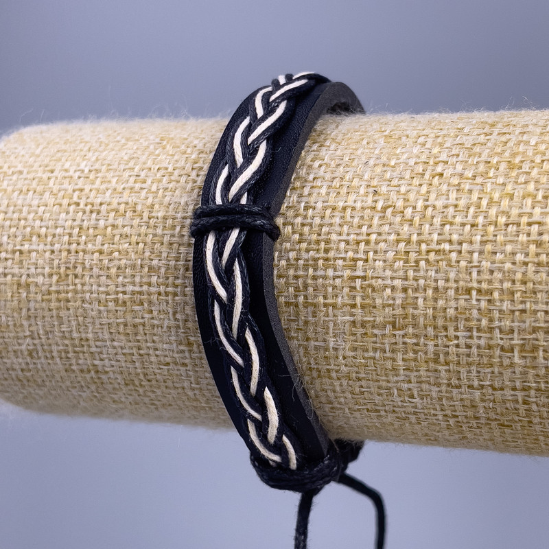 Bracelet, length 18-25 cm, thickness 12 mm, eco leather, black with white, on a slider