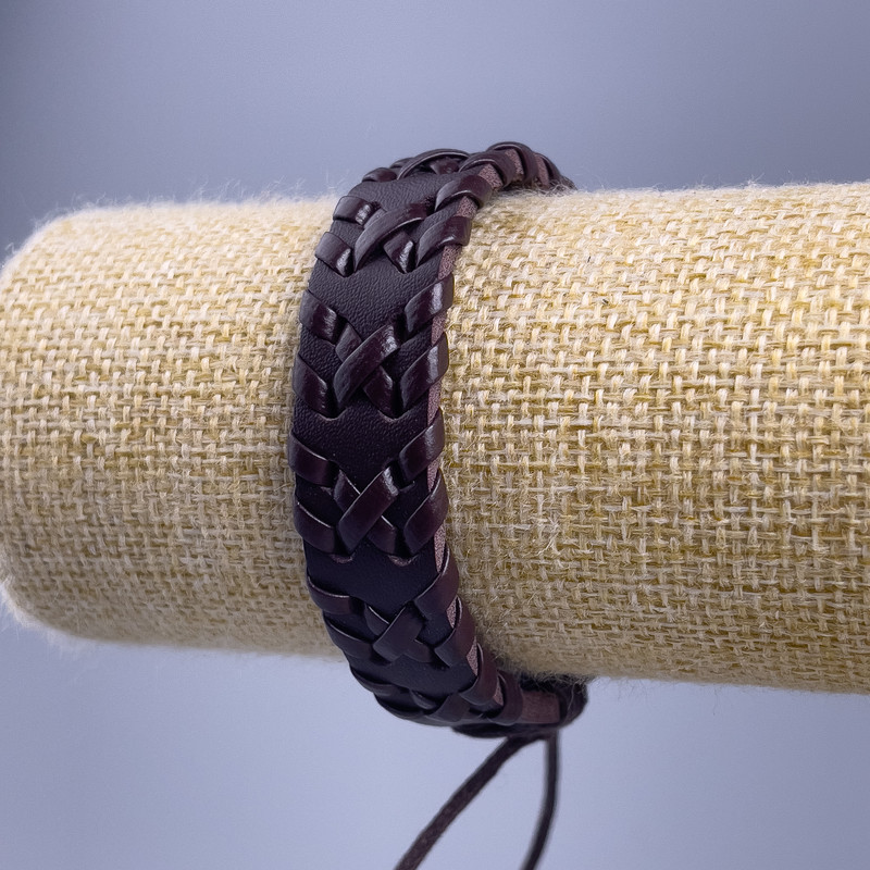 Bracelet, length 18-25 cm, thickness 15 mm, eco-leather, brown color, on a slide knot