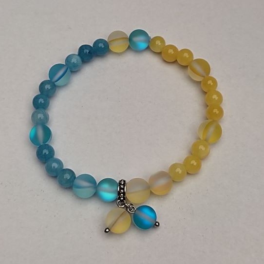Bracelet Citrine and Aquamarine (artificial acrylic beads), diameter 6.5mm, length 18cm (stretch) with Opal glass inserts, diameter 8mm