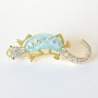Brooch Lizard blue aquarium effect, white and pink rhinestones, golden metal 24x71mm