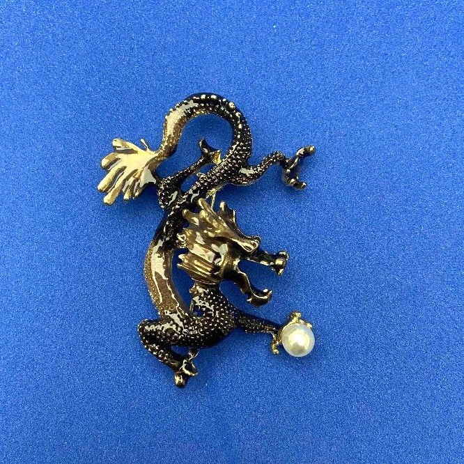Brooch Dragon with enamel brown and beige, white bead, golden metal 41x51mm