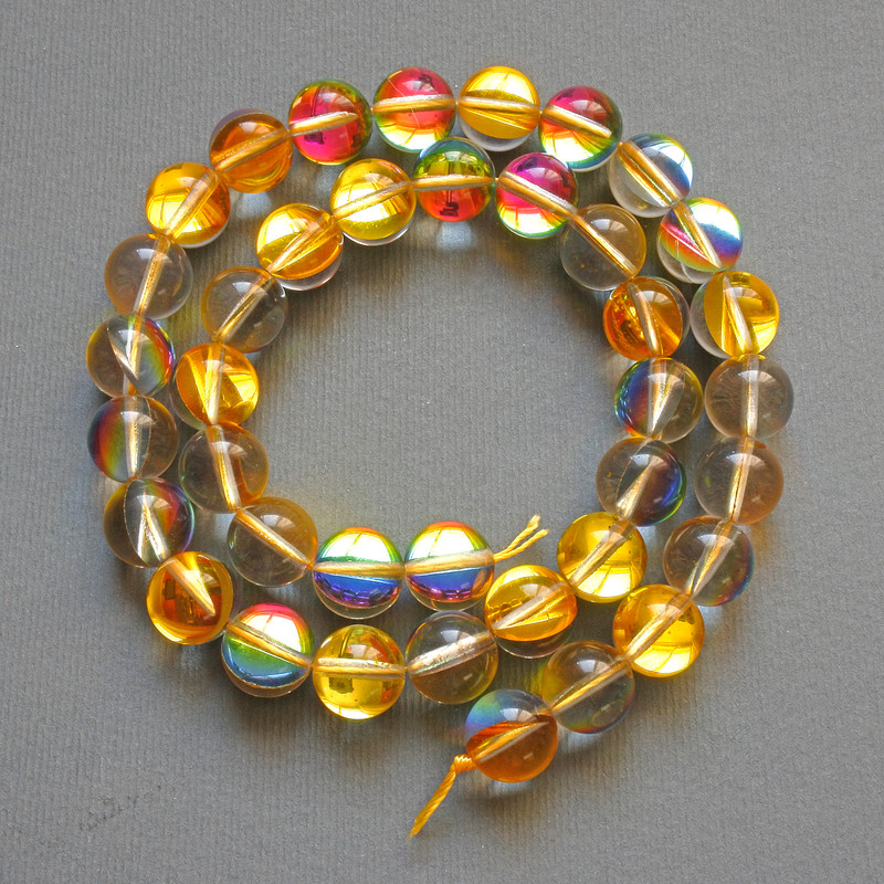 Opal glass beads yellow chameleon smooth ball, diameter 10mm±, length 38cm± on thread