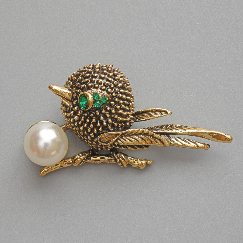 Brooch pendant Bird with green rhinestones, white bead golden metal 46x24mm