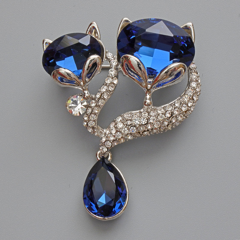 Brooch pendant Foxes with blue crystals, white rhinestones, silver metal 37x35mm