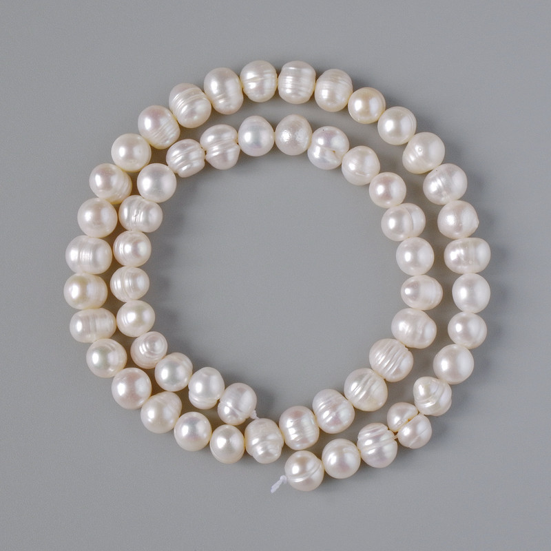 Freshwater Pearls with Relief, diameter 7.5×6mm ±, length 35cm ± on a thread