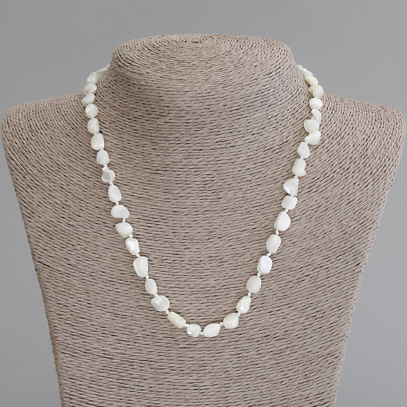 Necklace made of mother-of-pearl faceted, diameter 7-9x6-7mm +-, length 50cm +- with clasp
