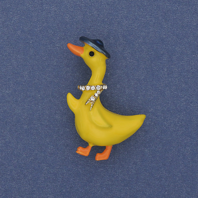 Brooch Goose with colorful enamel and white crystals on golden metal 40x23mm+