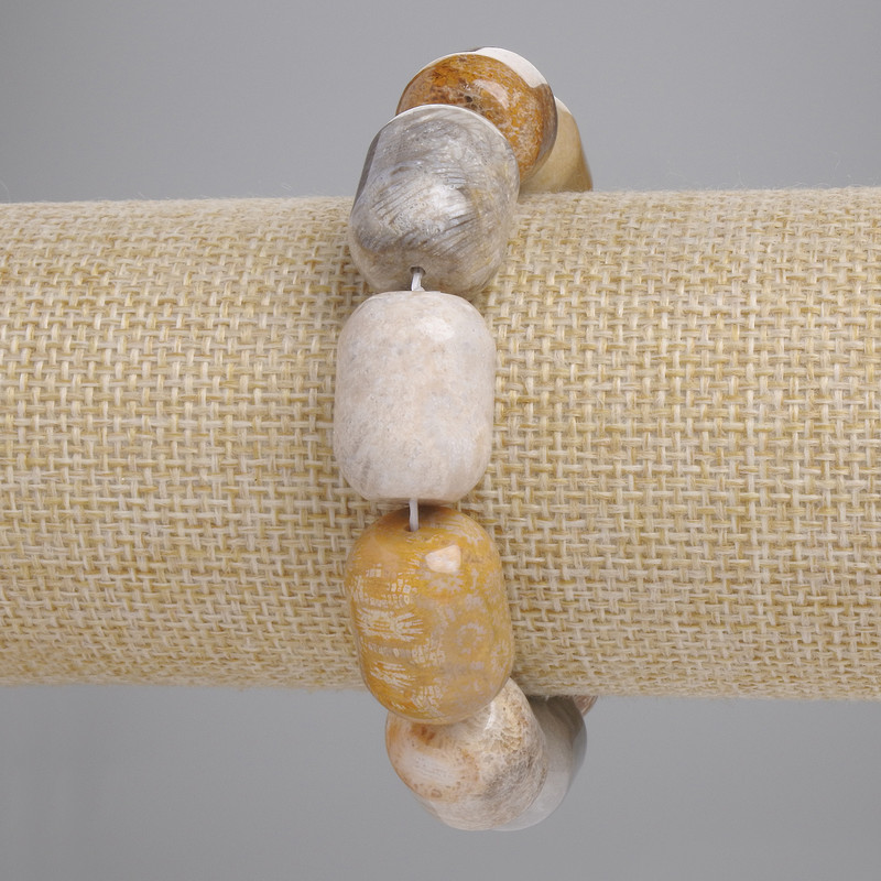 Bracelet of Fossilized Coral Barrels, diameter 19x15mm, adjustable length 18cm, stretch