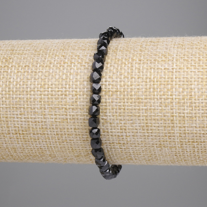 Bracelet, black tourmaline faceted cube 4x4mm +-, length 18cm +- stretch