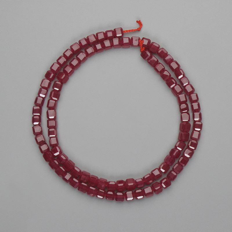 Ruby (corundum) beads faceted cube 4x4mm+- , length 38cm+- on a string