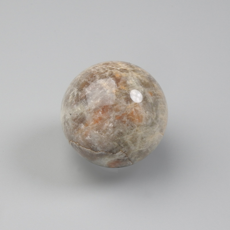 Souvenir sphere made of natural heliolite stone, diameter 40mm±, assorted sizes, weight from 60 g. (price per 100 g)