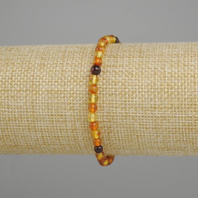 Amber bracelet smooth bead, diameter 4.5 mm±, length 18 cm stretch
